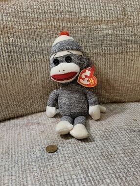 Ty Gray Sock Monkey Plush with Red Mouth and Red Pom-Pom